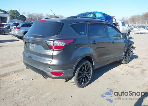 2017 Ford Escape Titanium z USA, uszkodzony, nr VIN 1FMCU0J91HUE85232
